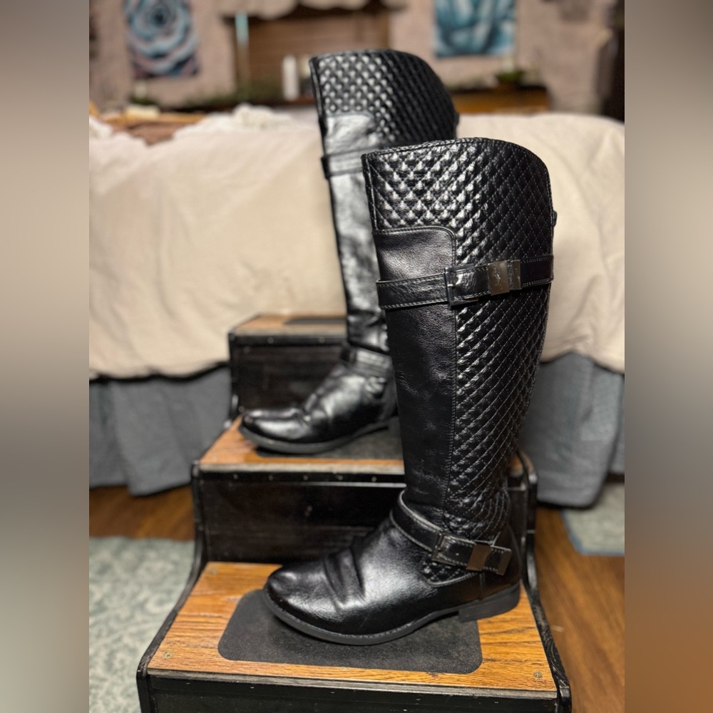 Nicole black quilted knee high boots.